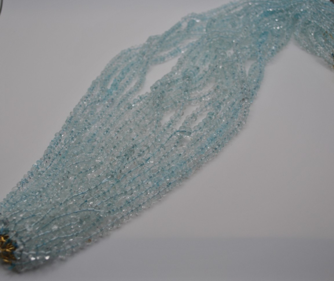 blue topaz (coloured) gemstone strand with smooth stones (no clasp)