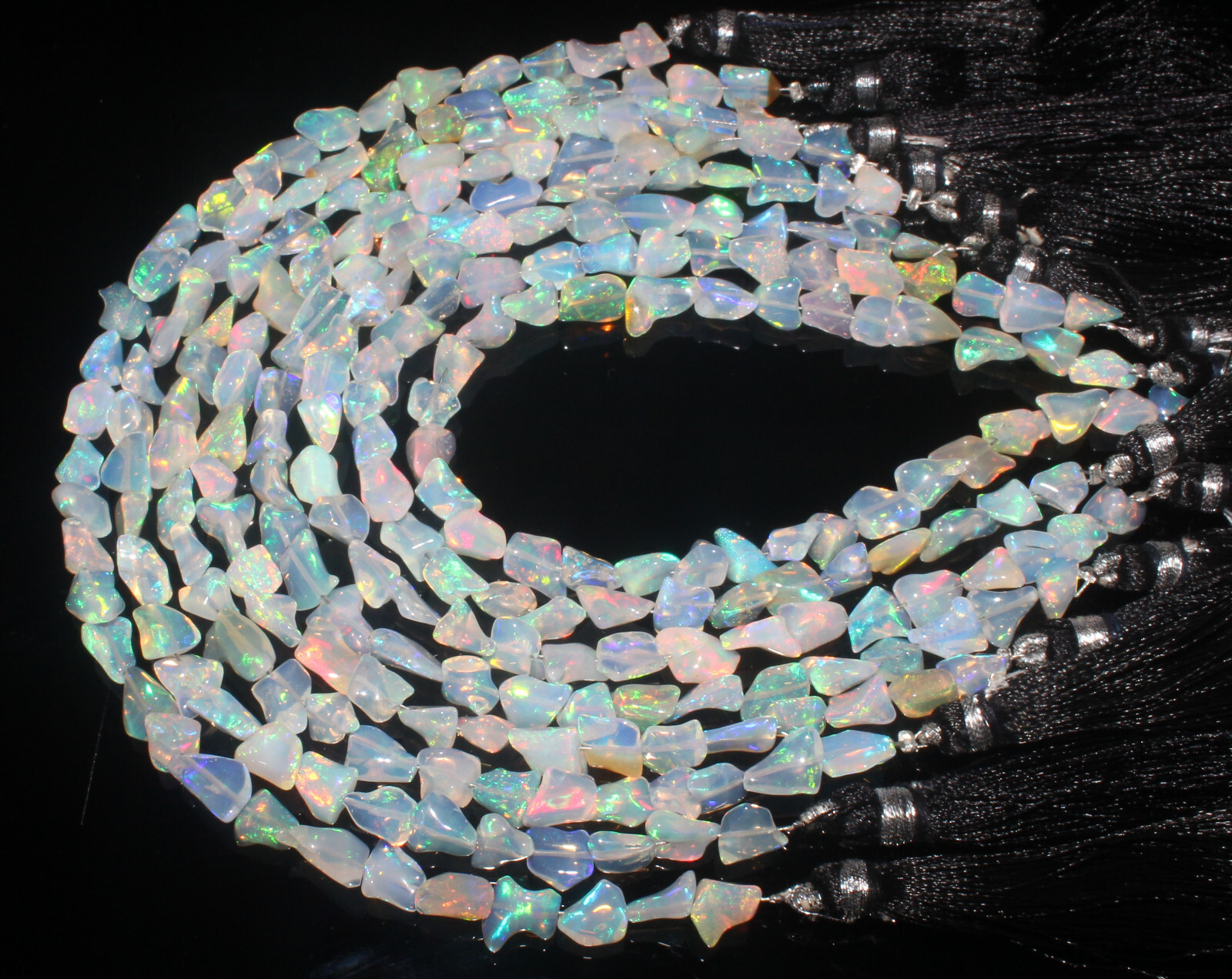 AAA+ Ethiopian Welo Fire Opal Polished Rough Play of Color Specimen 8” Strand
