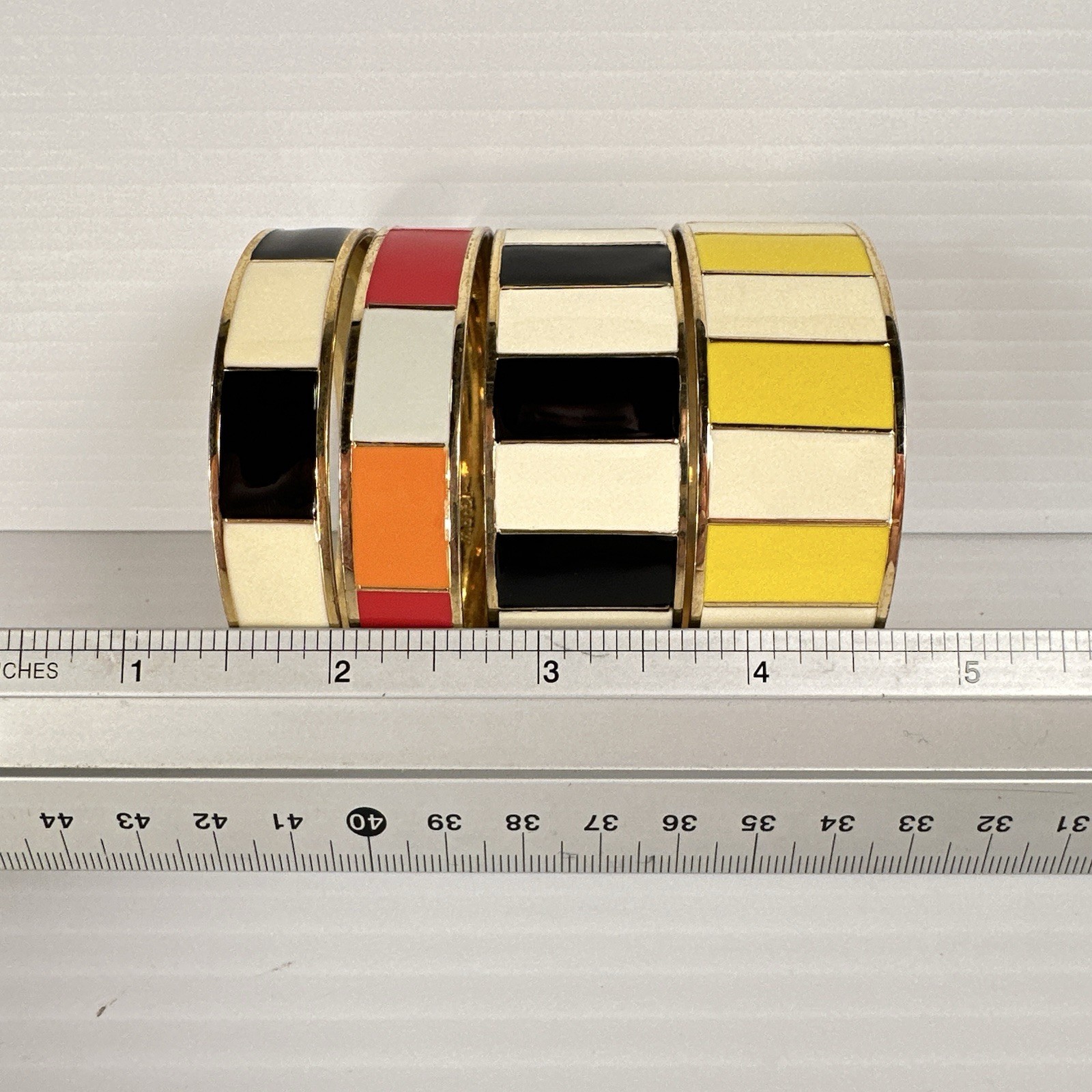 J Crew Lot 4 Gold Tone Bangle Bracelets Striped Enamel Black Yellow Orange Red