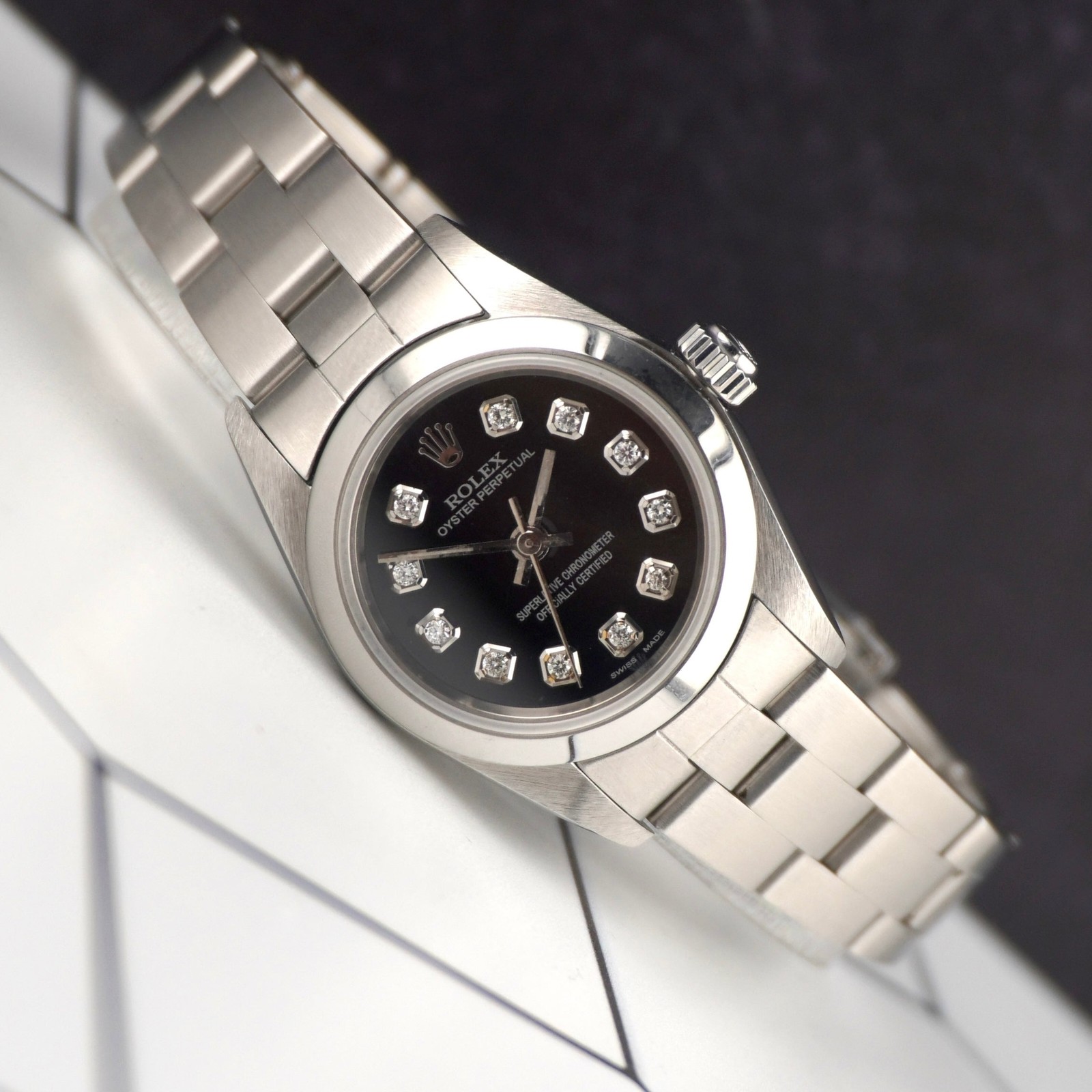 Rolex Oyster Perpetual 25mm Steel Black Diamond Smooth Oyster Watch 67180