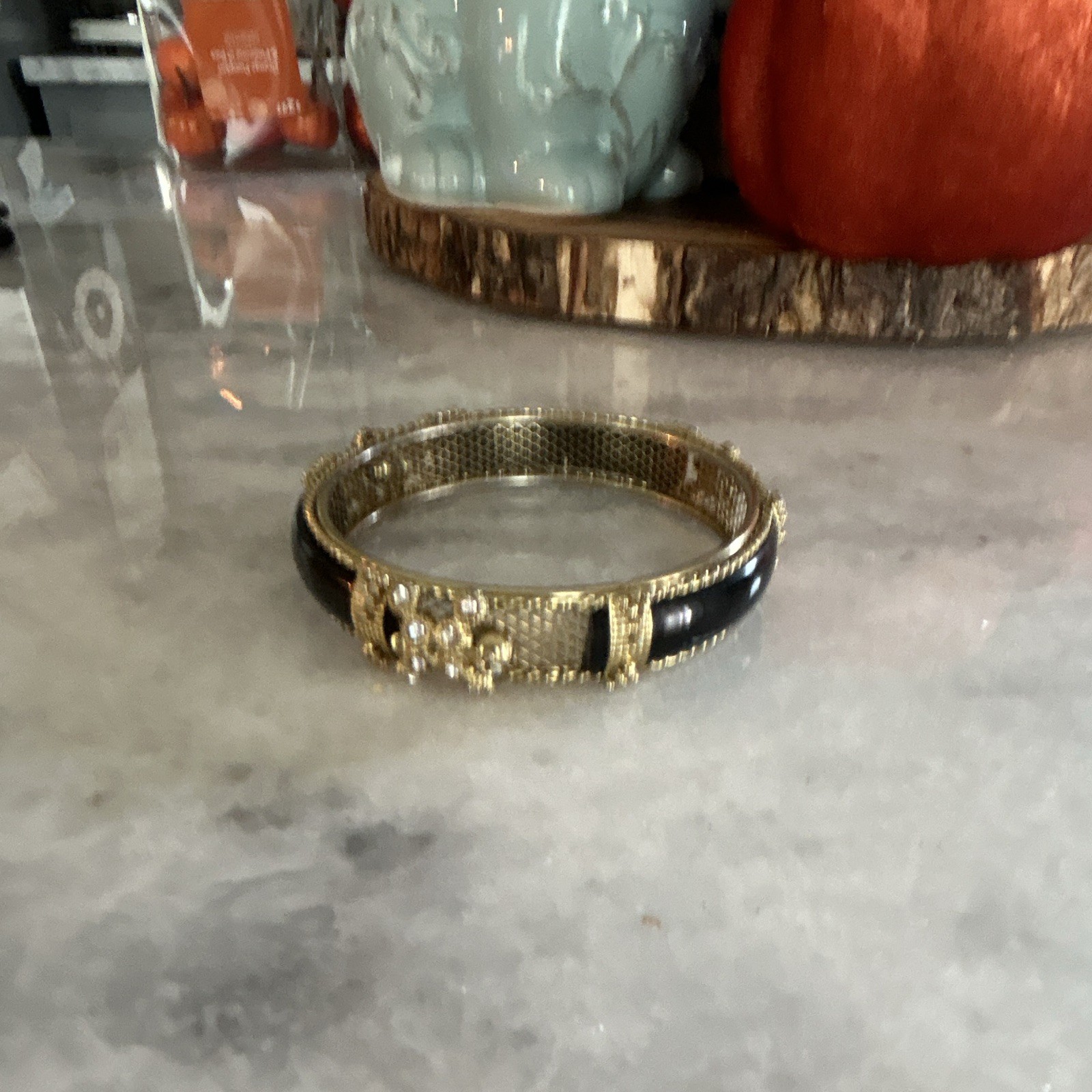 Gold Tone Black Hinged Bangle Bracelet with Clear Crystal Rhinestone Floral