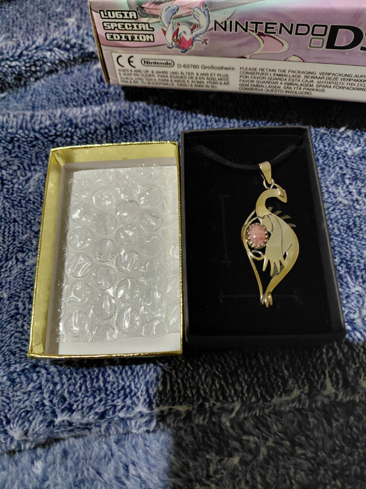 Pokémon Shiny Lugia Egg Hand-Made Stainless Necklace with Pink Rhodo- Gem Stone