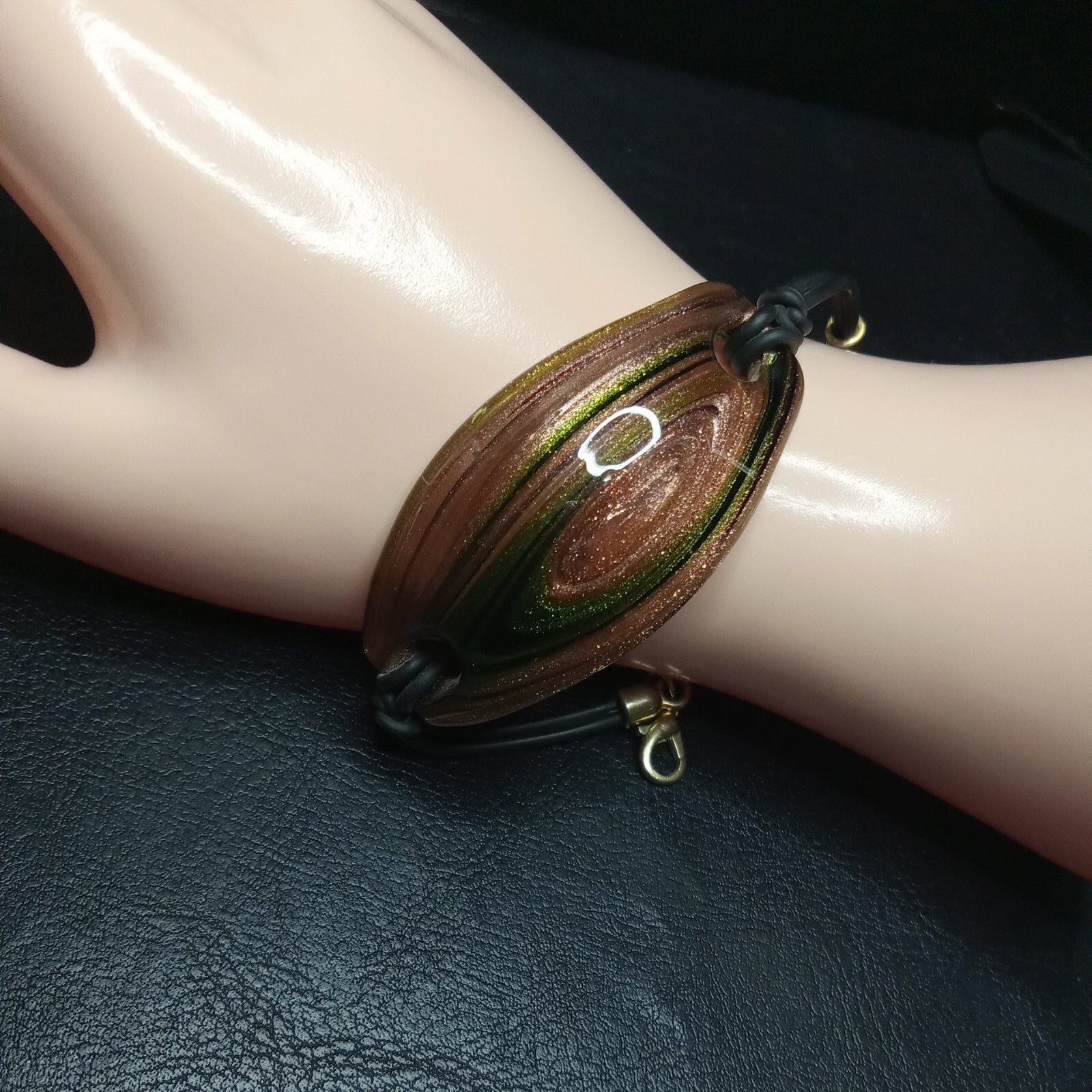 MURANO GLASS Gold/Green Rubber Cord Bracelet. 6312