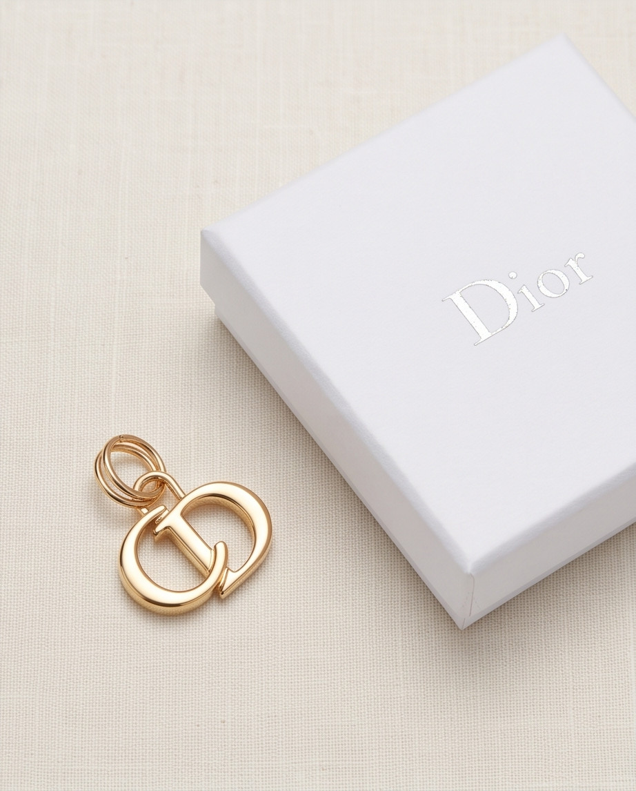 CHRISTIAN DIOR PENDANT ZIPPER pull gold toned stamped 0.6 inch