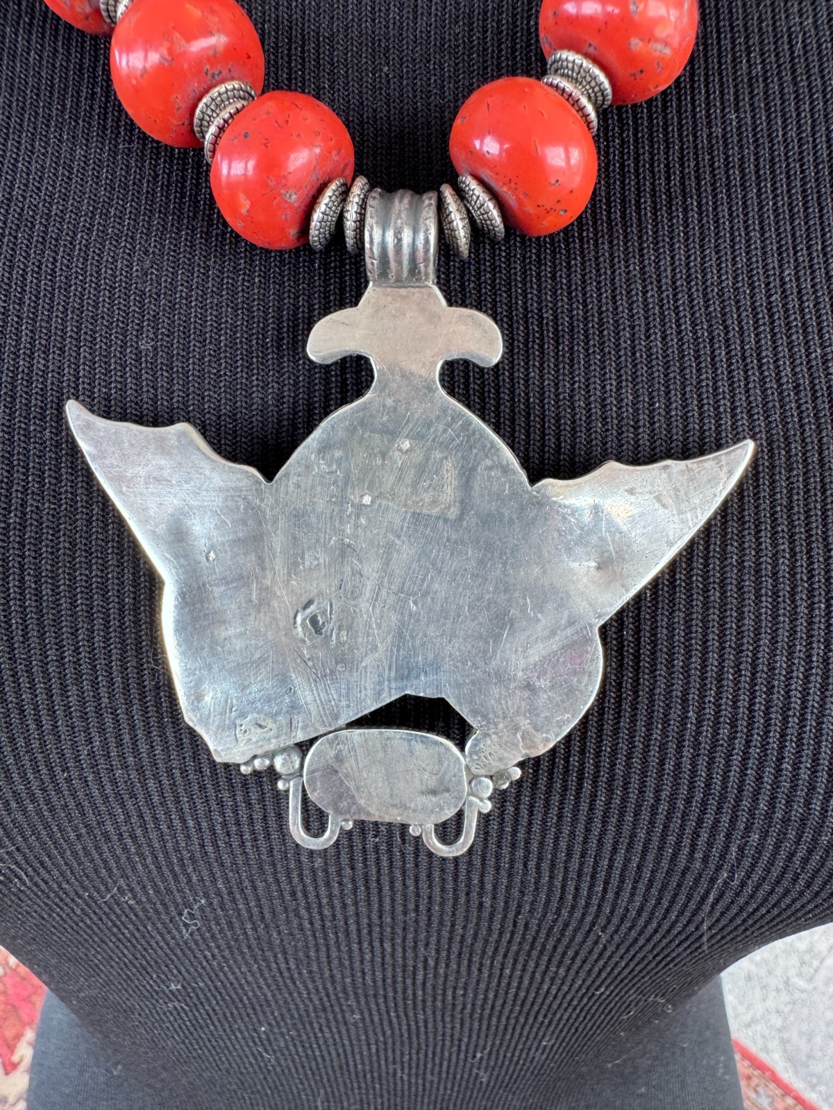 Silver Garuda pendant strung with natural coral and turquoise