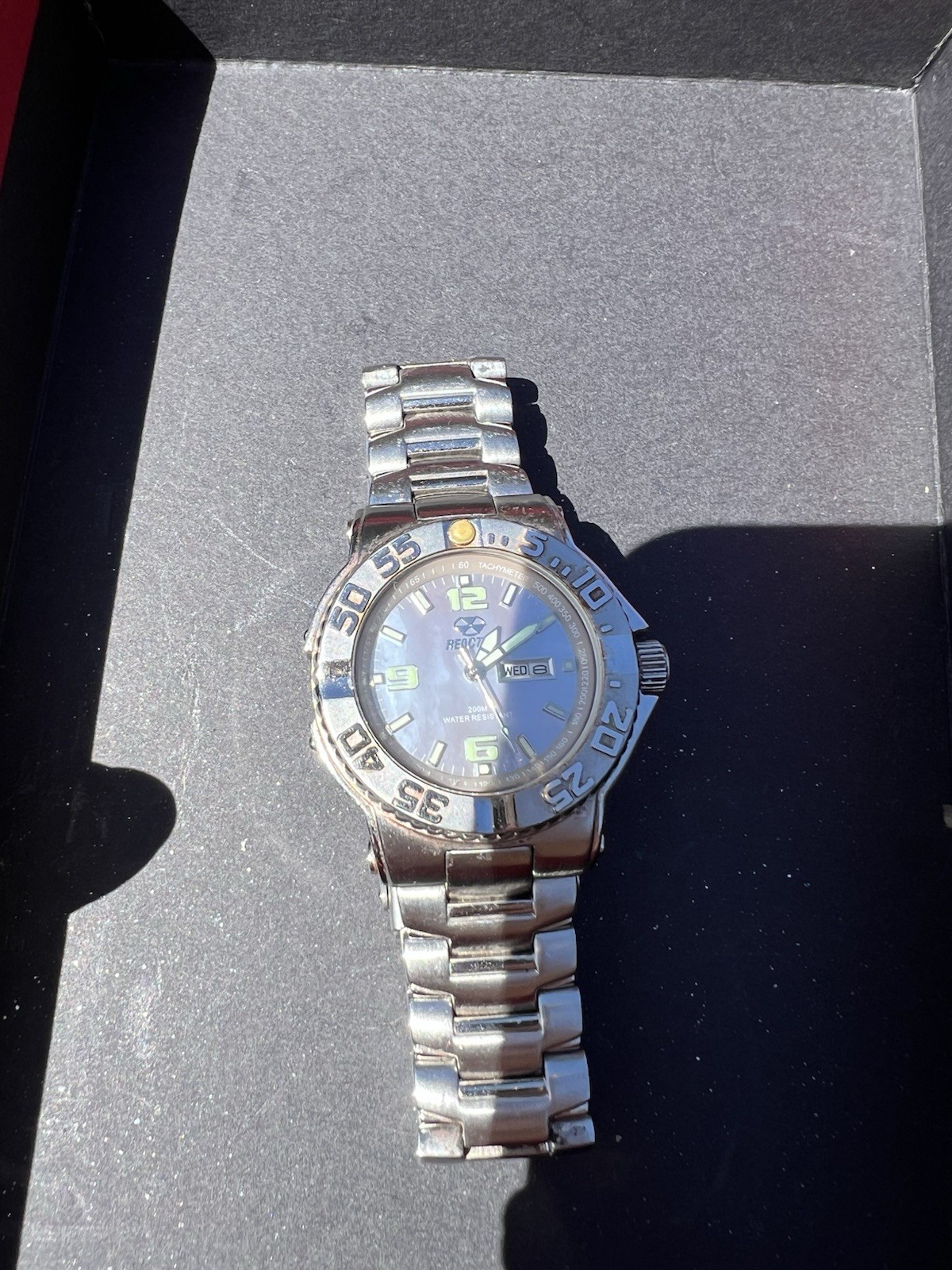 Reactor Critical Mass Men’s Quartz 200m Day/Date Black Dial SS Bracelet
