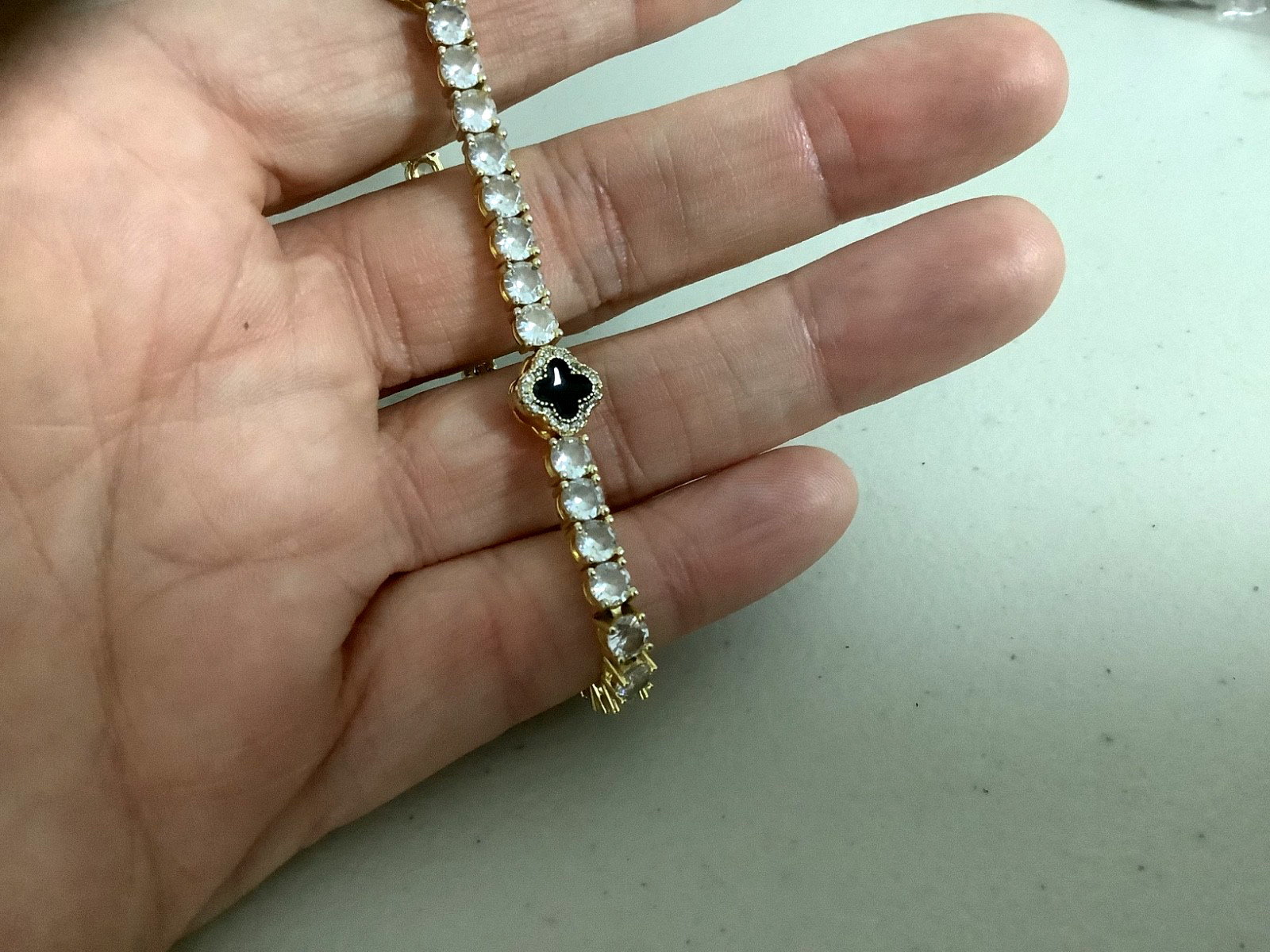 Imperium 18k gold plated CZs four leaf clover black enamel tennis bracelet 7″