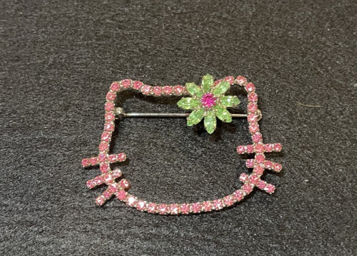 Tarina Tarantino Hello Kitty Silhouette Pink w/Green Swarovski Crystals Brooch