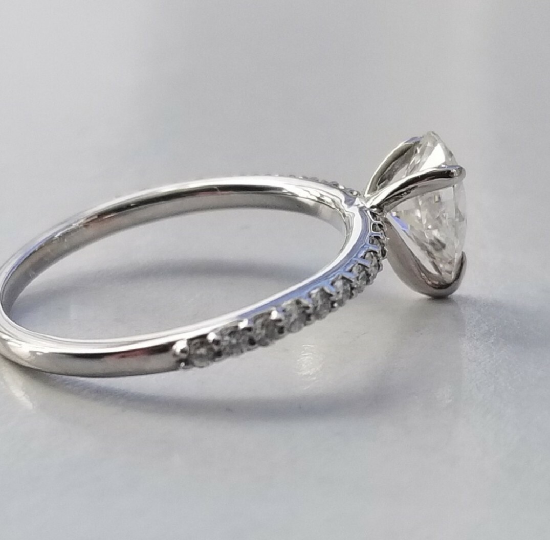1.50 CARAT FOREVER ONE MOISSANITE PEAR SHAPE CHARLES & COLVARD RING