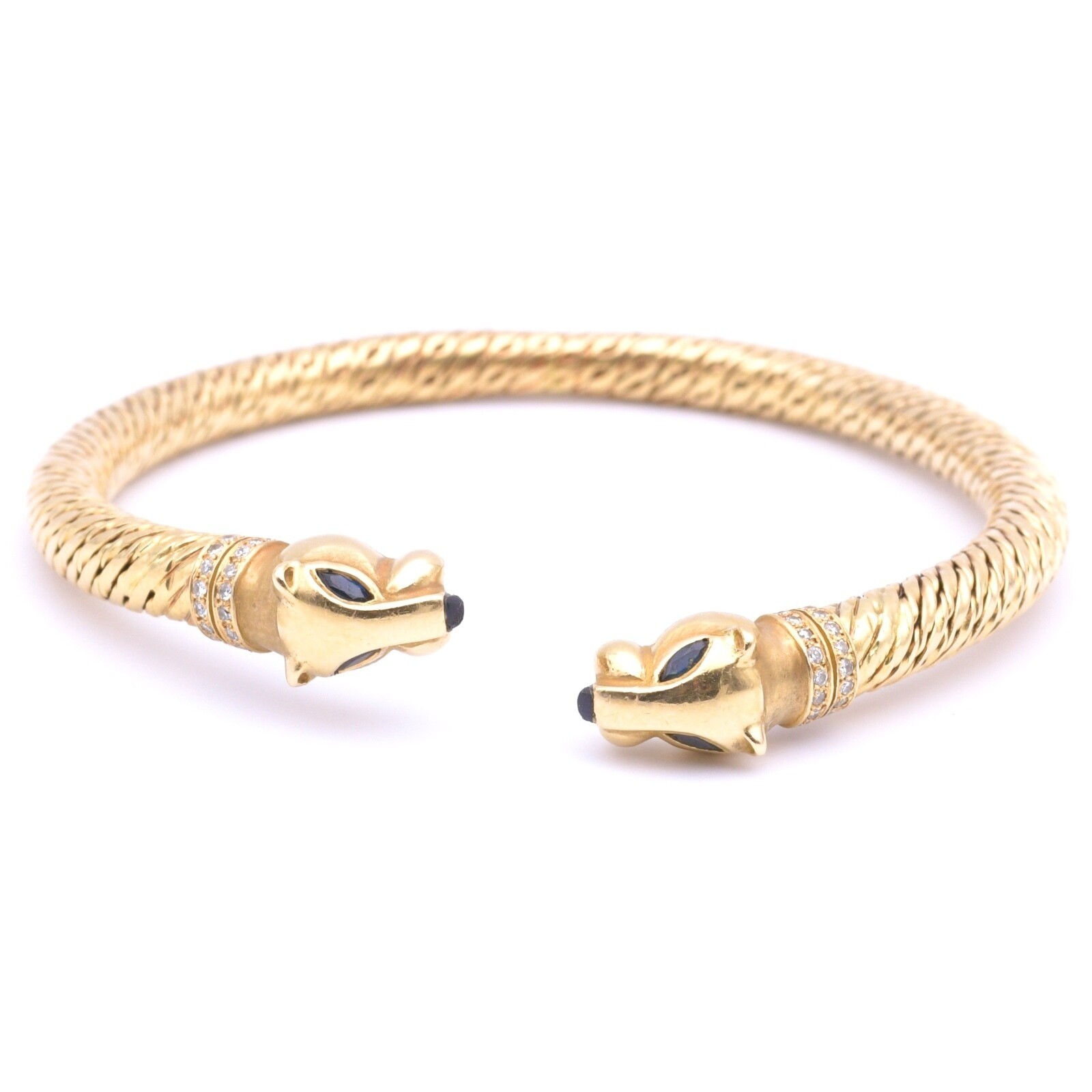 Cartier Vintage Double Head Panther Bracelet in 18Kt. GG with Safirs and Onyx