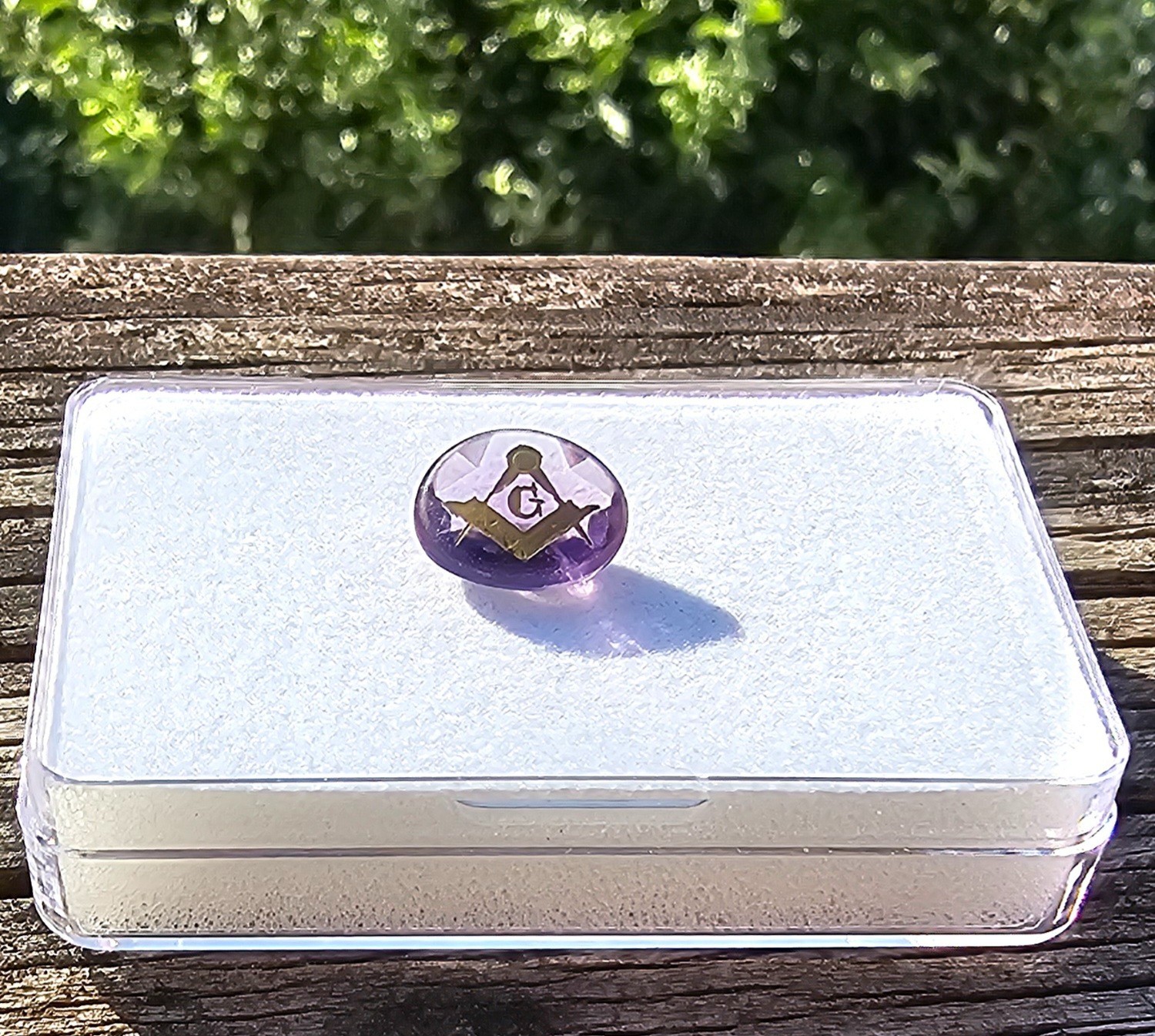 Amethyst 11.4×9.5mm Oval Loose Stone with Mason symbol