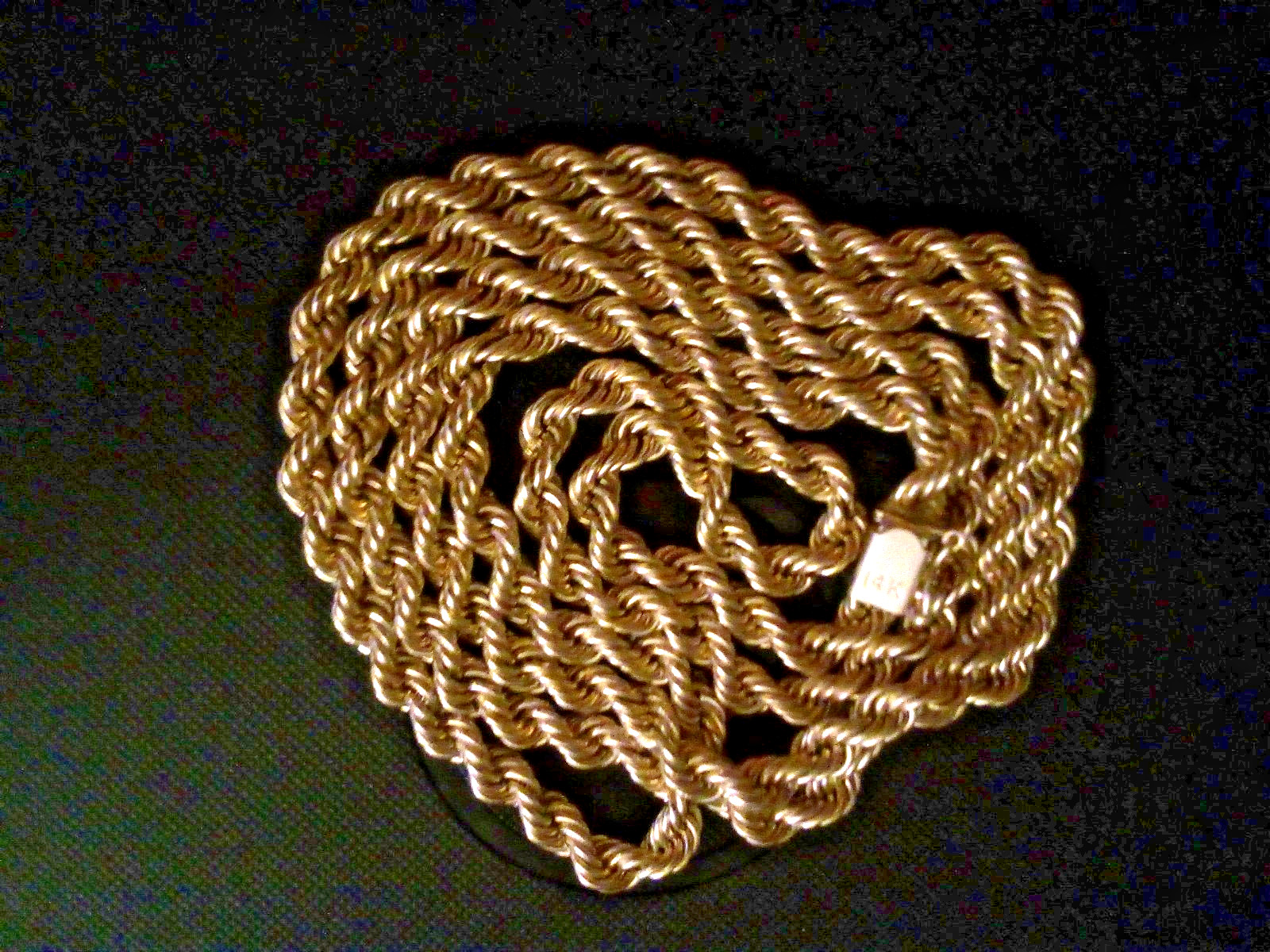 14k YELLOW GOLD ROPE NECKLACE 30 INCHS, 23.9 GRAMS, STAMPED.