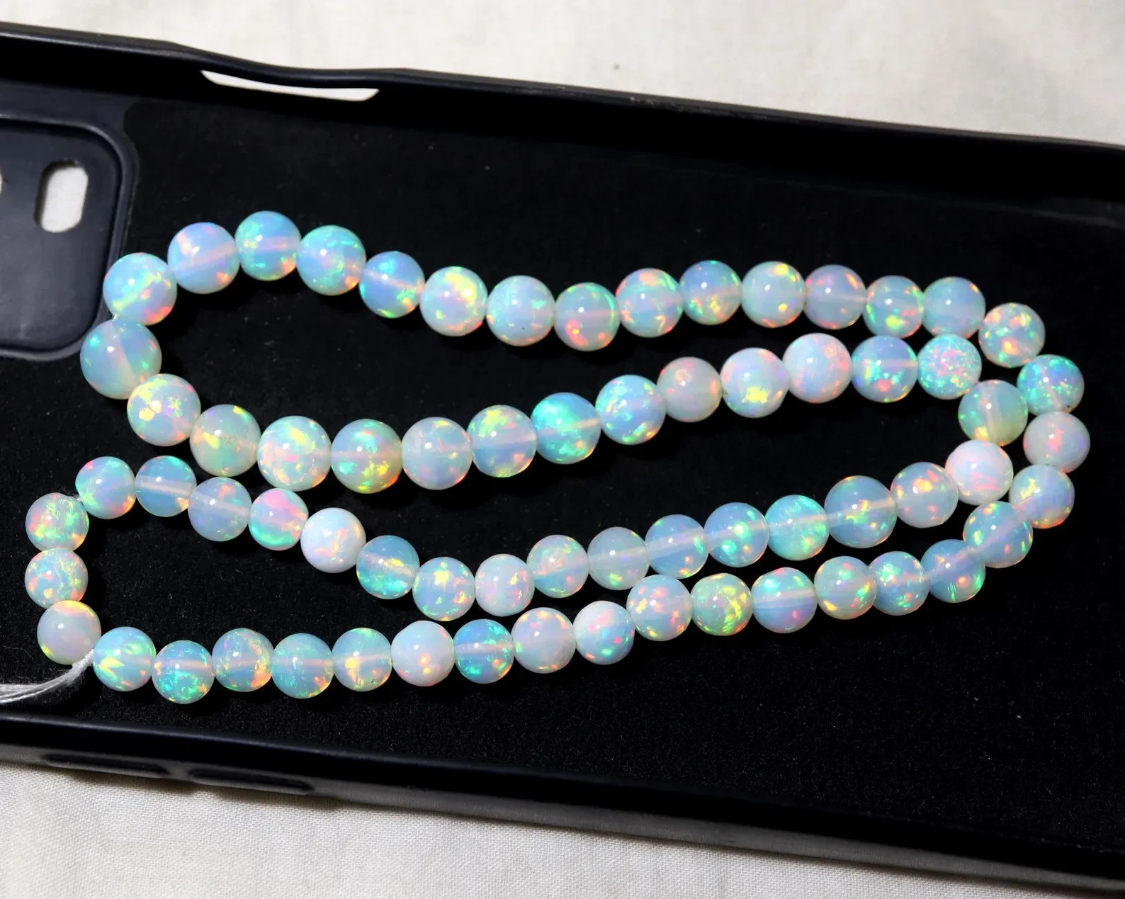 6to8mm Sphere Natural Ethiopian Opal Beads Strand: 8″ AAAA Flashy Fire White