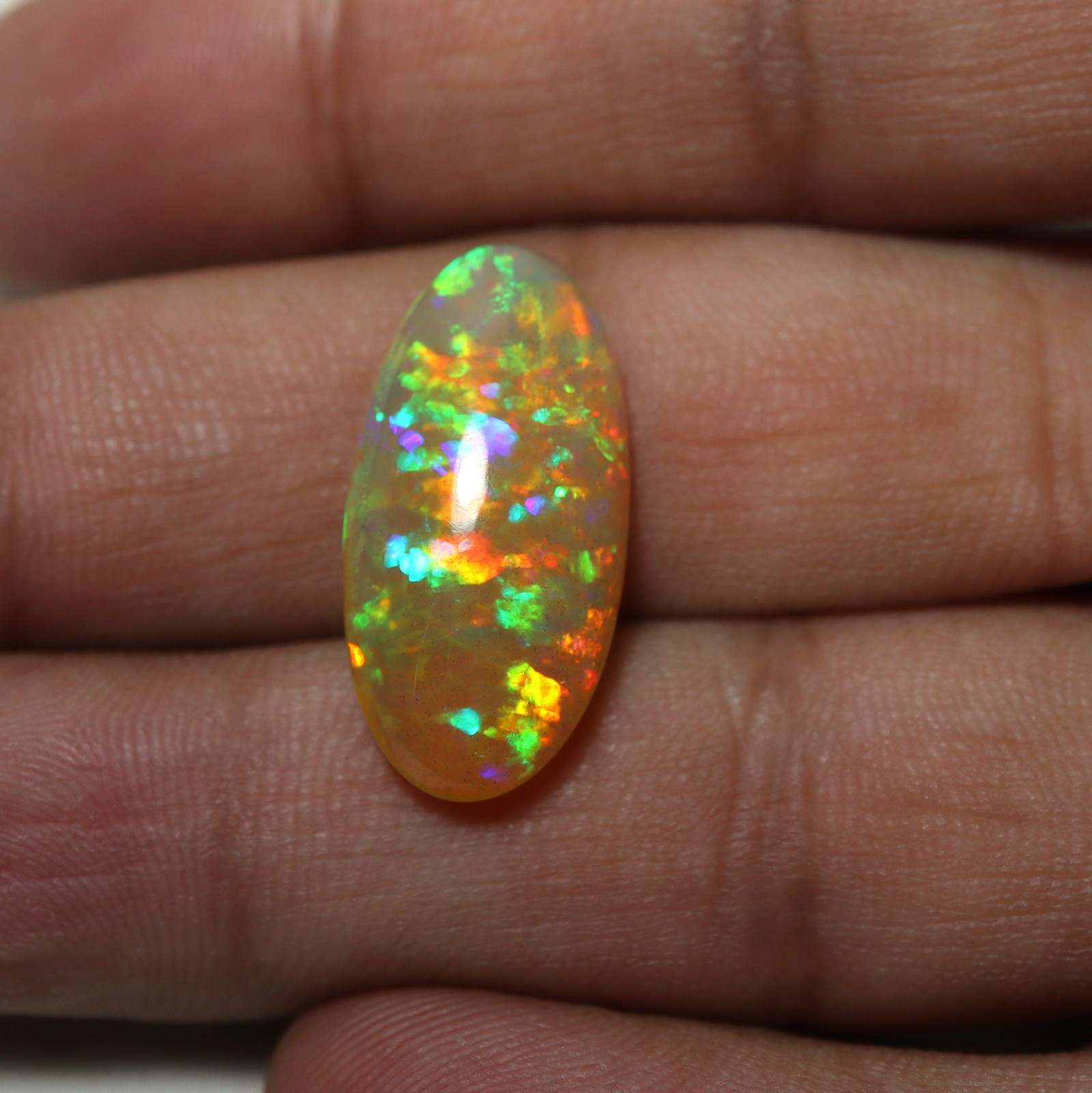 8.8Cts Natural AAA Ethiopian Opal Oval Flashy Rainbow Fire Cabochon 23.1×11.8 MM