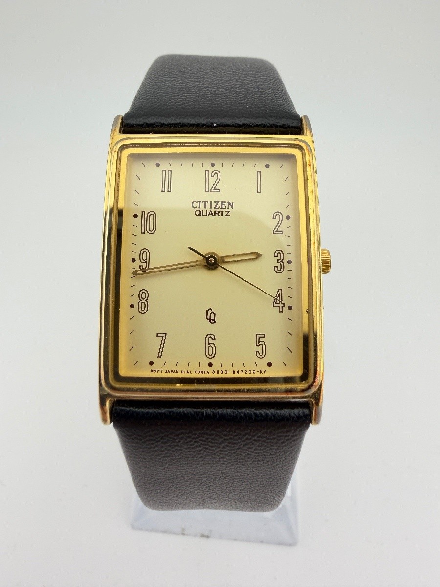 Citizen 3630 Gold Tone Rectangle Quartz Wristwatch Champagne Dial Black tank 
