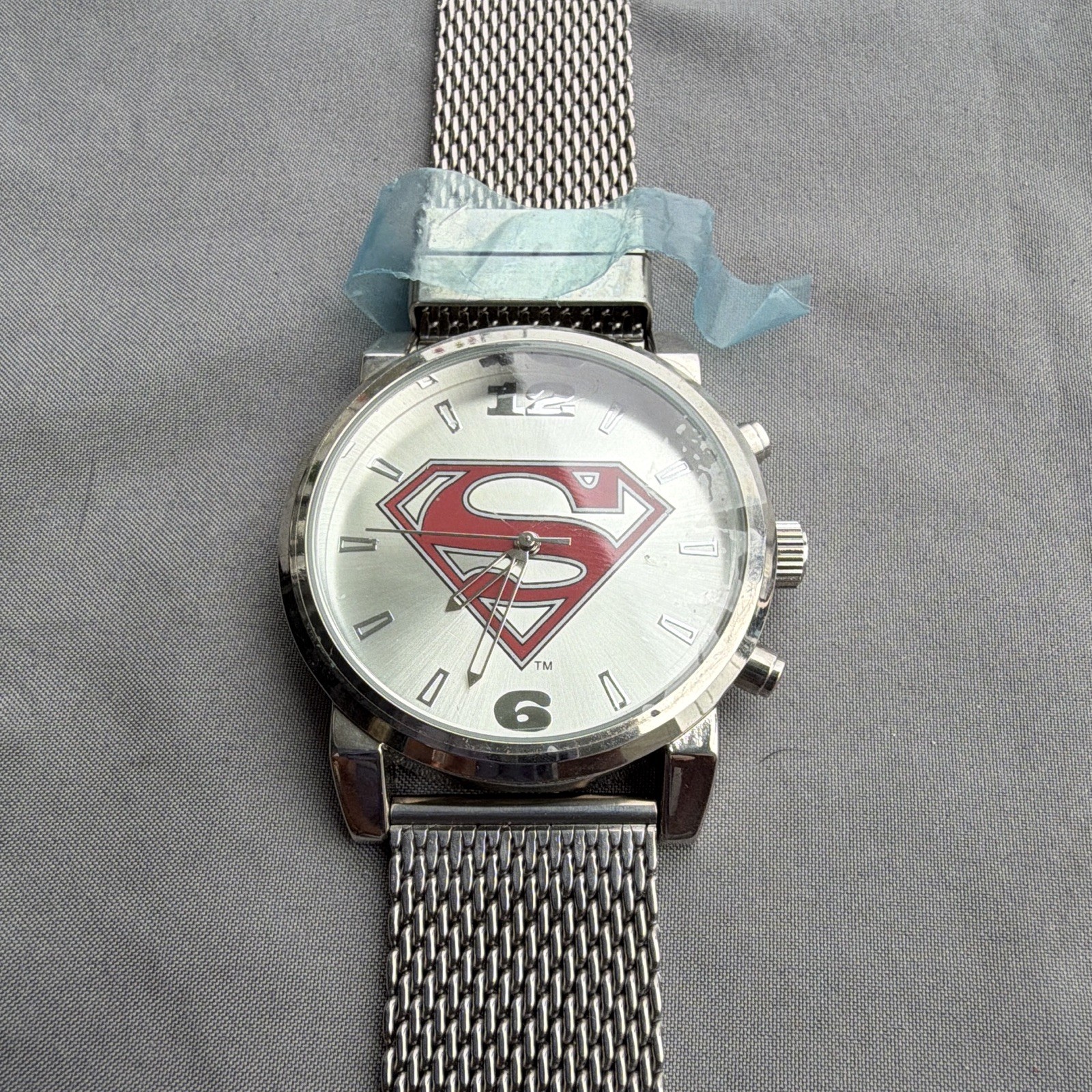 DC Comics Superman Quartz Analog Silver Tone Logo Dial Stainless Steel Mesh