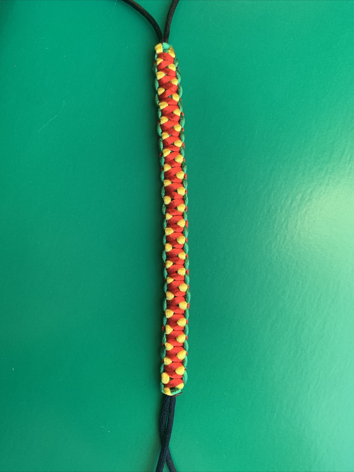 GUYANA Bracelet RED BLACK YELLOW GREEN Satin Rattail Cord Shamballa Nylon