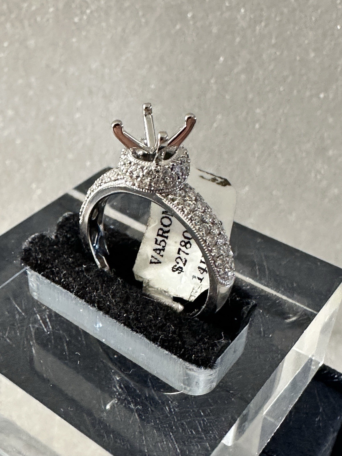 14kt,white gold semi mount ring with 0.62ct, VS2 clarity size 6, 4.40 grams.