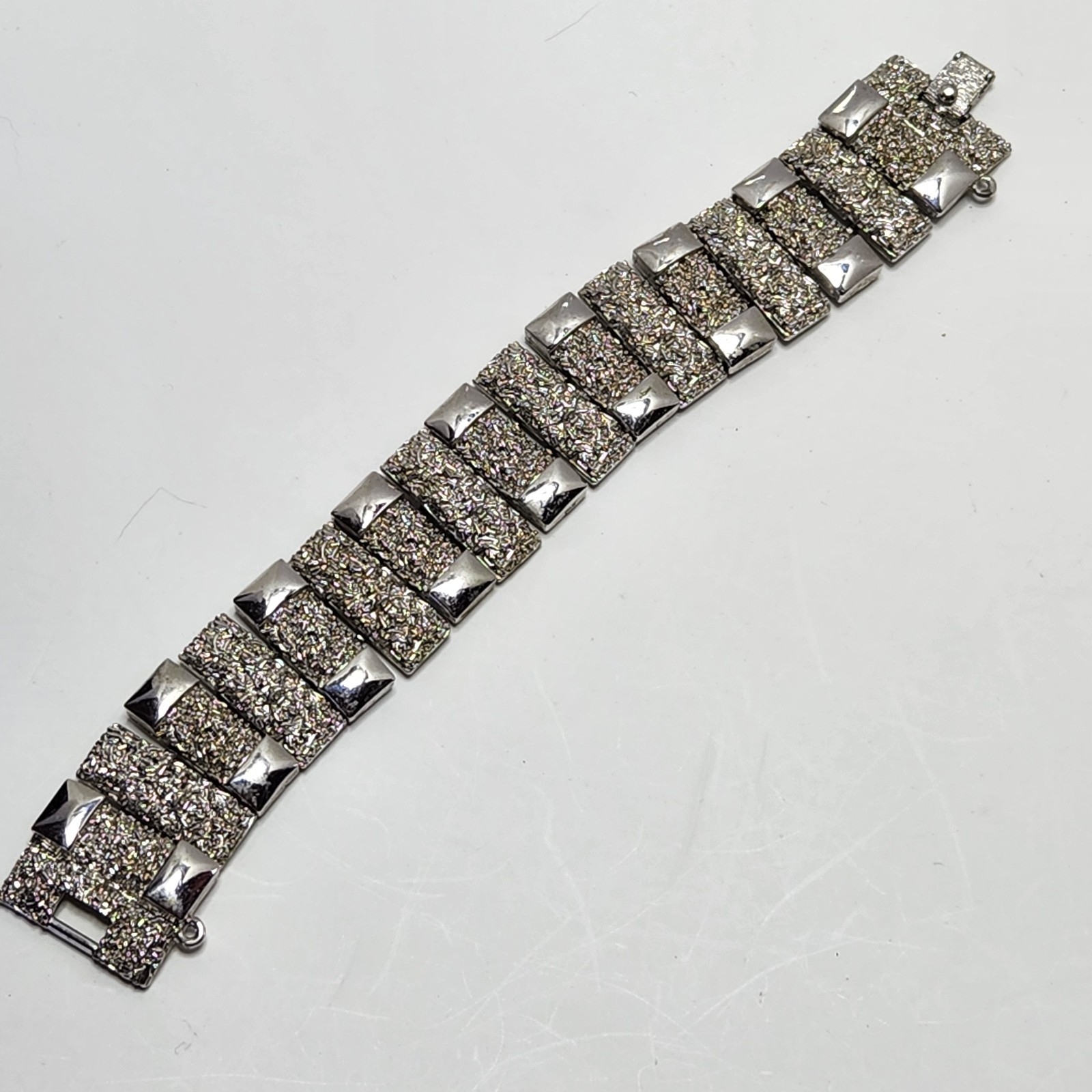 Vintage Monet Silvertone Bracelet Textured 1″ wide 7″ Fold Over Clasp No Safety
