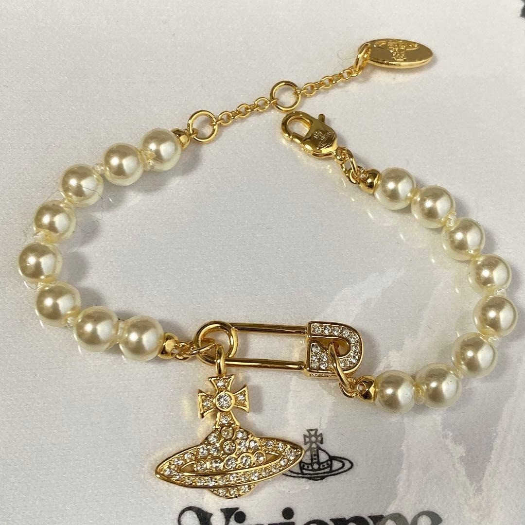 Vivienne Bracelet Mini Bas Relief Pearl Clip Orb Gold w/Pouch IN BOX
