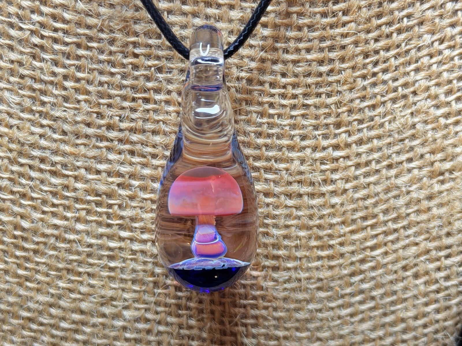 Glass Teardrop Mushroom Pendant in reds and purples with cobalt blue base