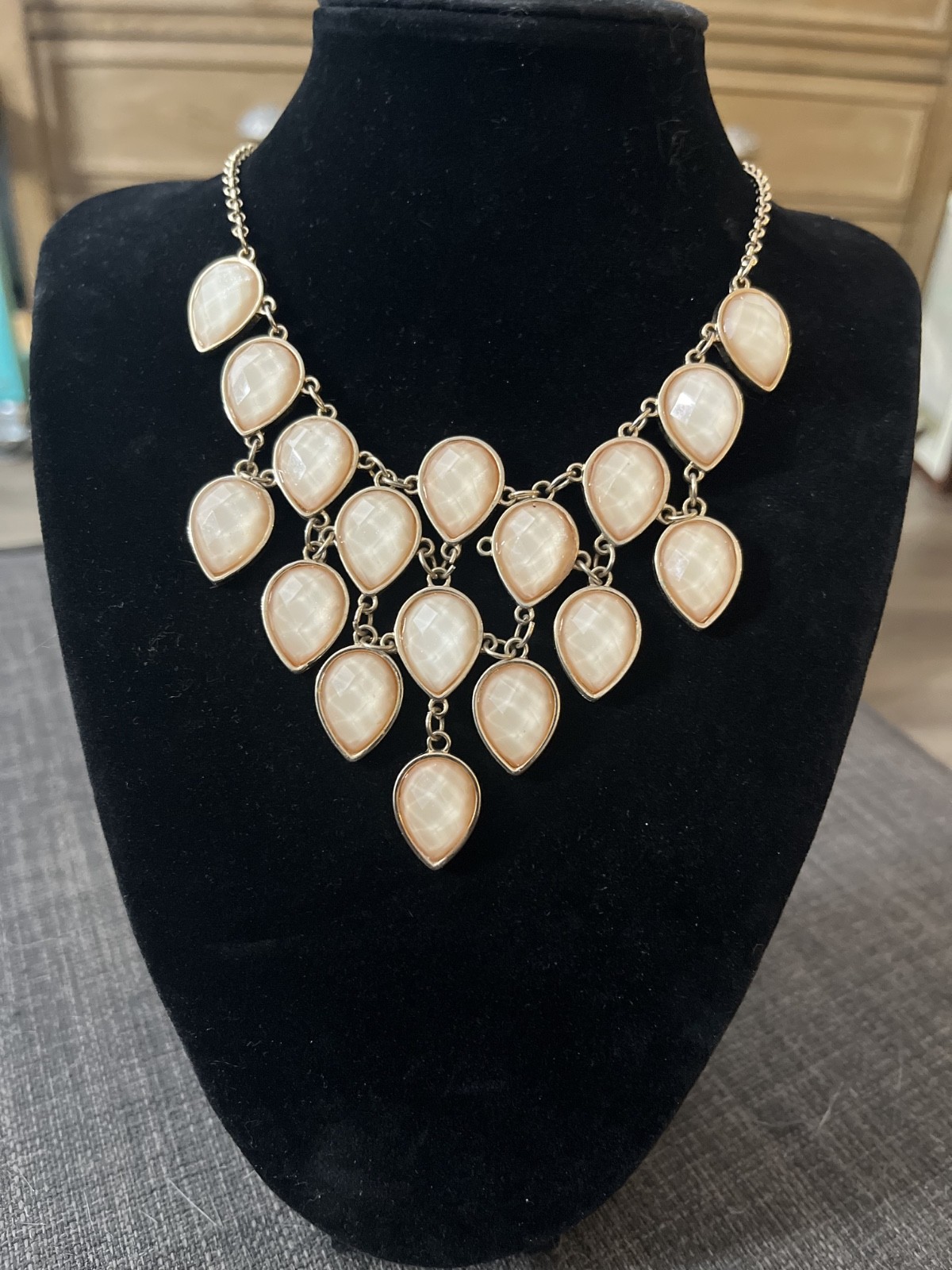 Cream champagne colored acrylic gem statement necklace in gold tone metal