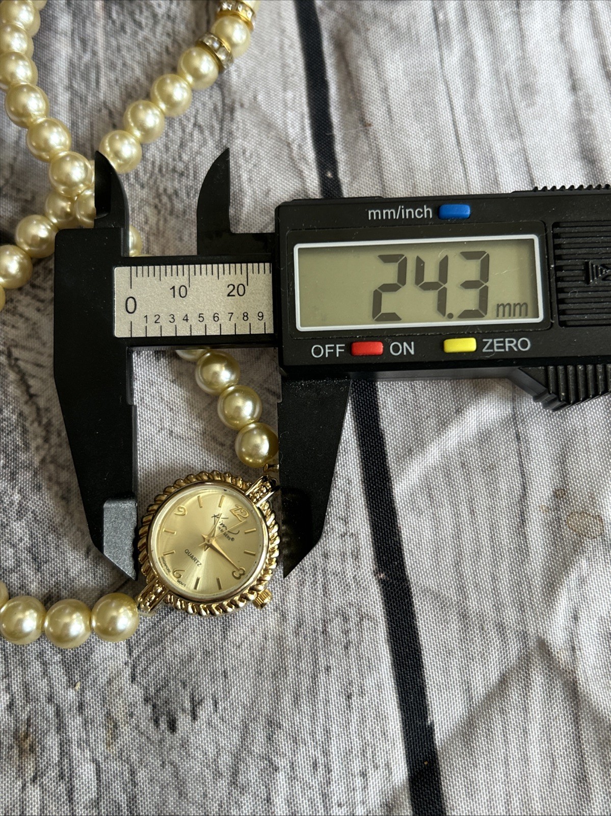 Kim Rogers Gold Tone Pearl Wrap Style Band Watch