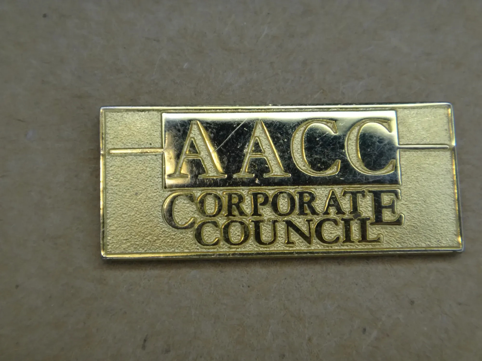 AACC Corporate Council Gold Tone Metal Rectangular Lapel Pin Clasp Back