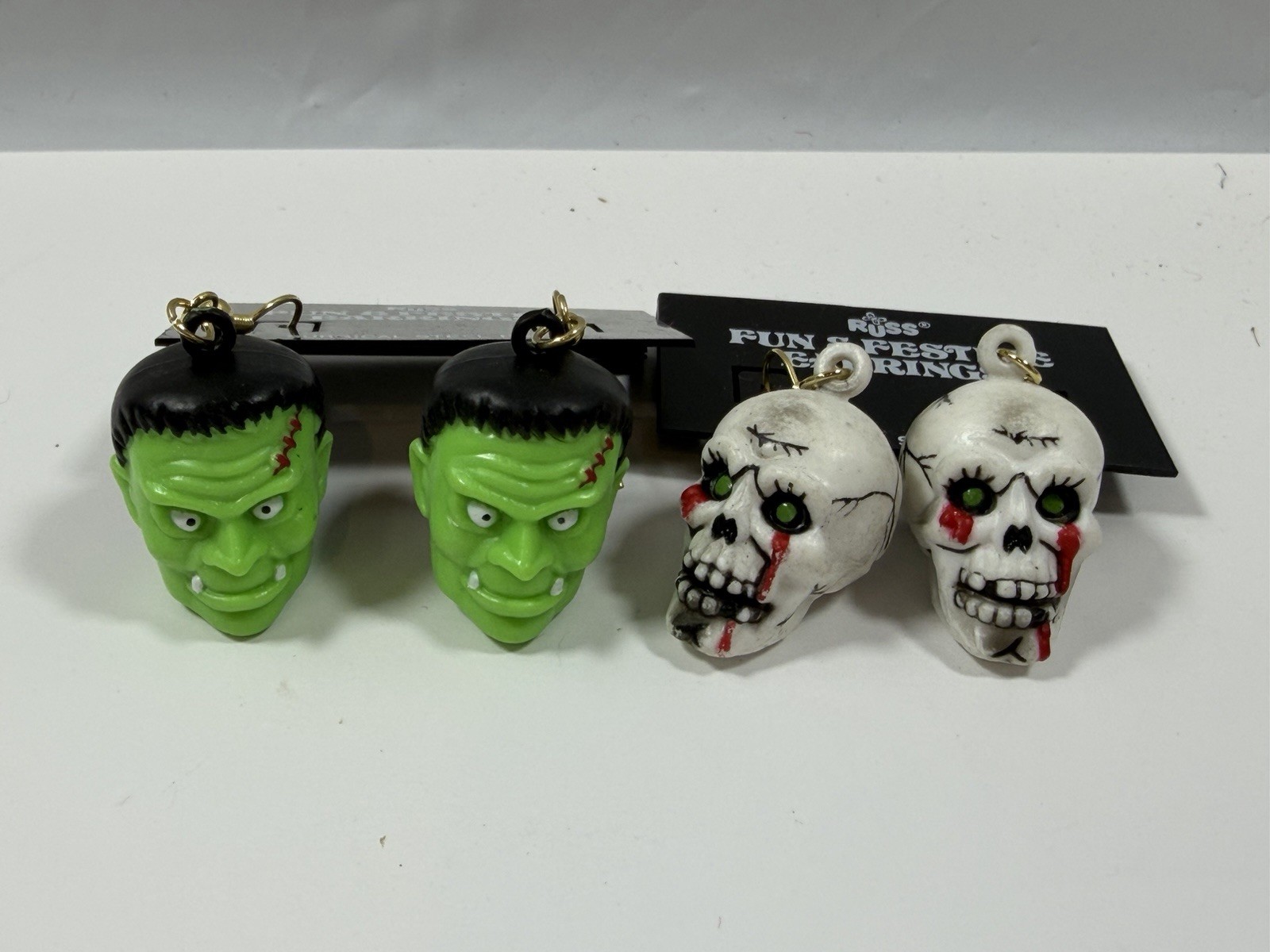 2 PAIRS Vintage Halloween Earrings Frankenstein Monster Skulls Russ Dangle Drop