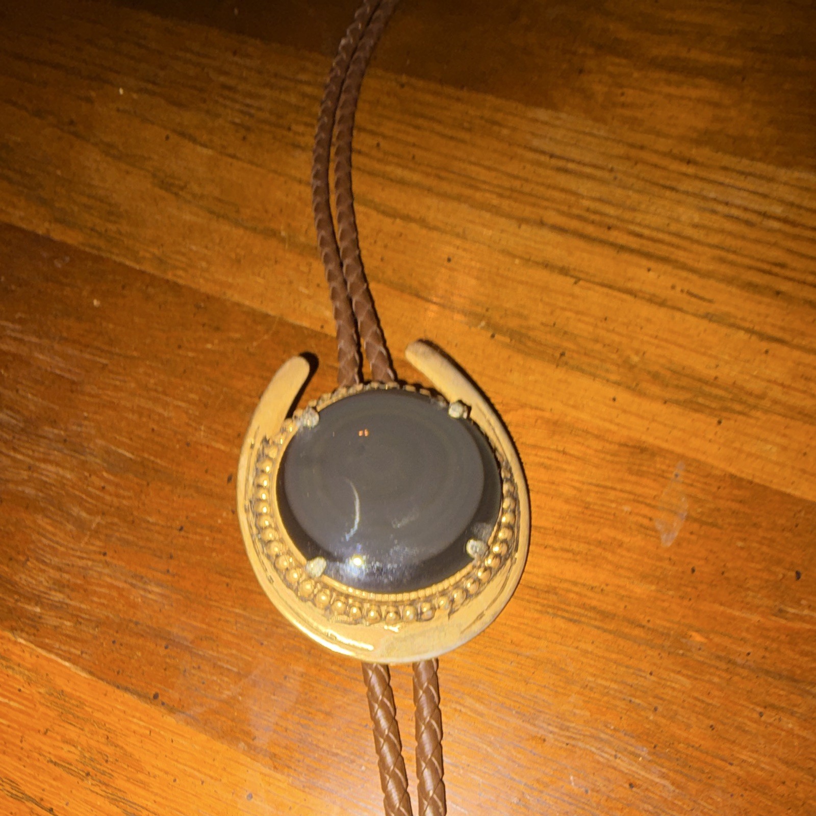 Men’s vintage Western Horseshoe Bolo Tie with natural black onyx pendant