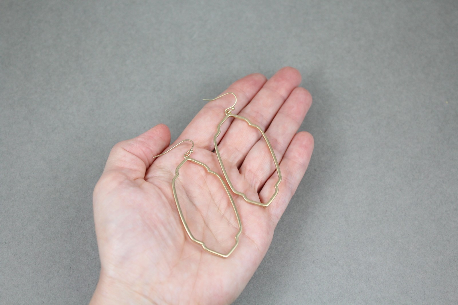 Gold oval teardrop earrings dangle cutout filigree oval outline 2.75″ long