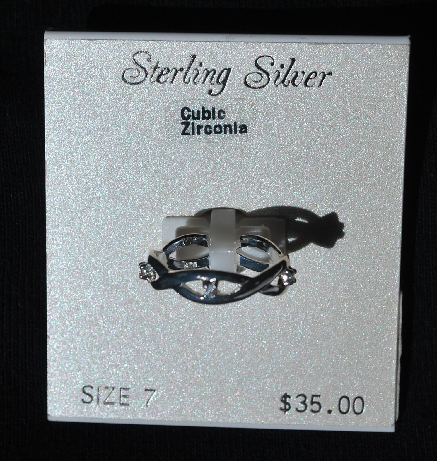 NWT – Sterling Silver Cubic Zirconia ring (size 7) weave design – MSRP $35