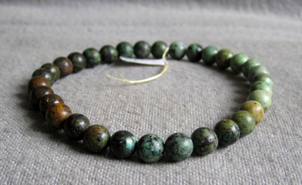 Armband aus Türkis / Tansania Kugeln Ø ca. 6 mm / 15-20 cm Weite elastisch