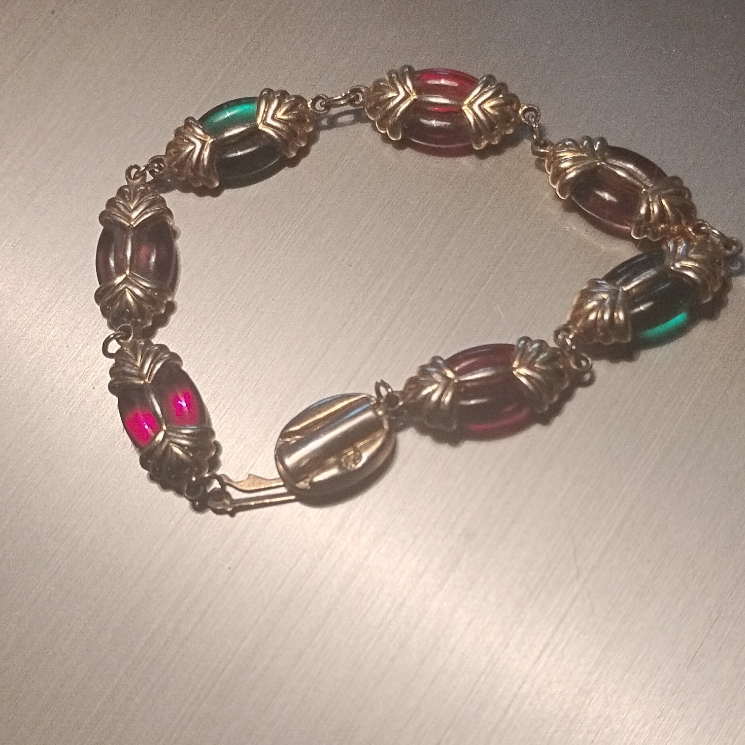 Swarovsi Gold Tone Cable Chain Bracelet Red Green and Purple Oval Glass Beads