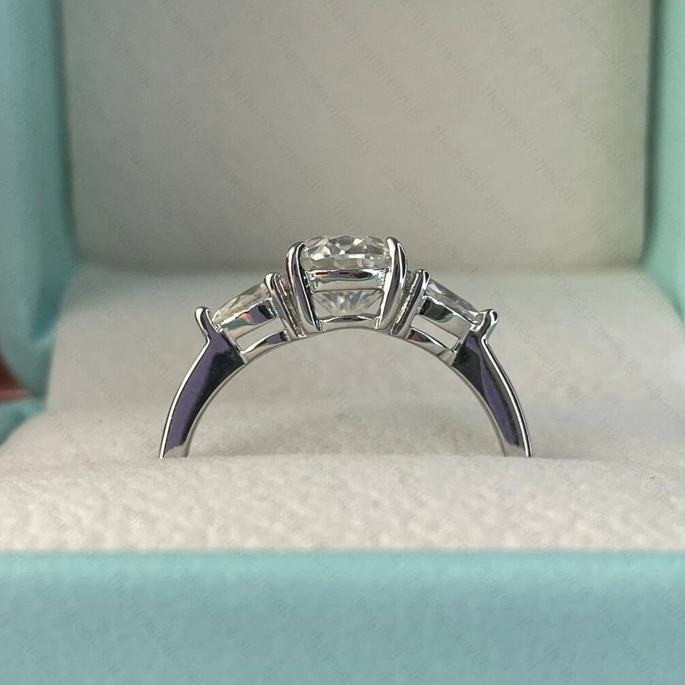3.10 TCW Oval Cut Moissanite Three Stone Engagement Ring 14K White Gold Plated