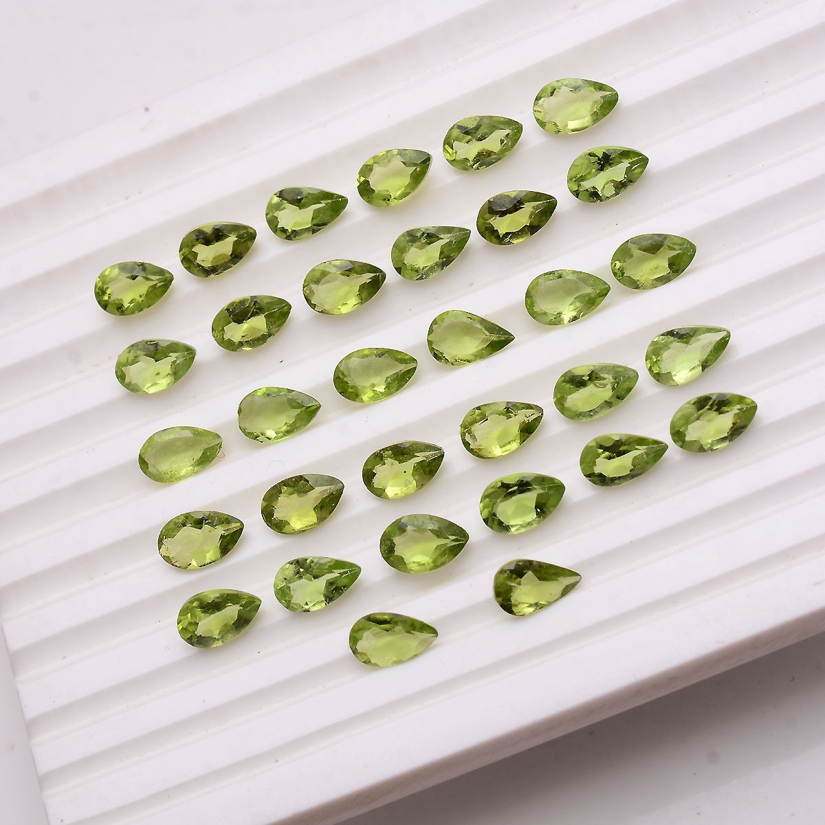 32 Pcs VVS Natural Peridot 7.74mm-8.20mm Pear Cut Stunning Untreated Gemstones
