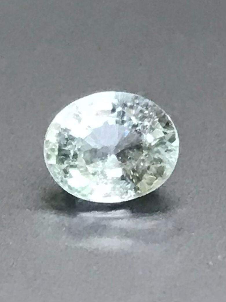 0.74 Ct 6.16×5.14×3.66mm Copper Bi-Color Paraiba Tourmaline Certified