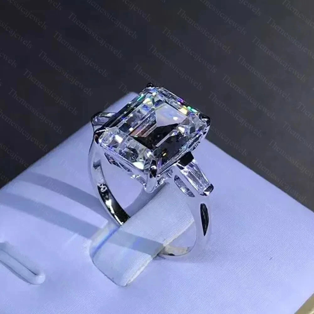 9.0TCW Emerald Cut Moissanite 3-Stone Engagement Ring In 14k White Gold Plated