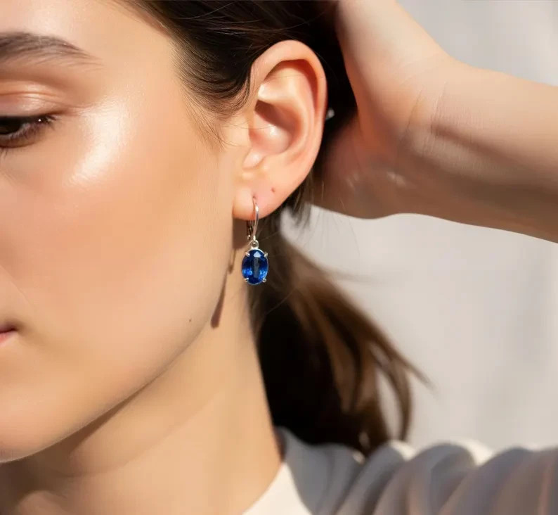 Stunning Lab-Created Oval Sapphire Lever Back Earrings in Sterling Silver