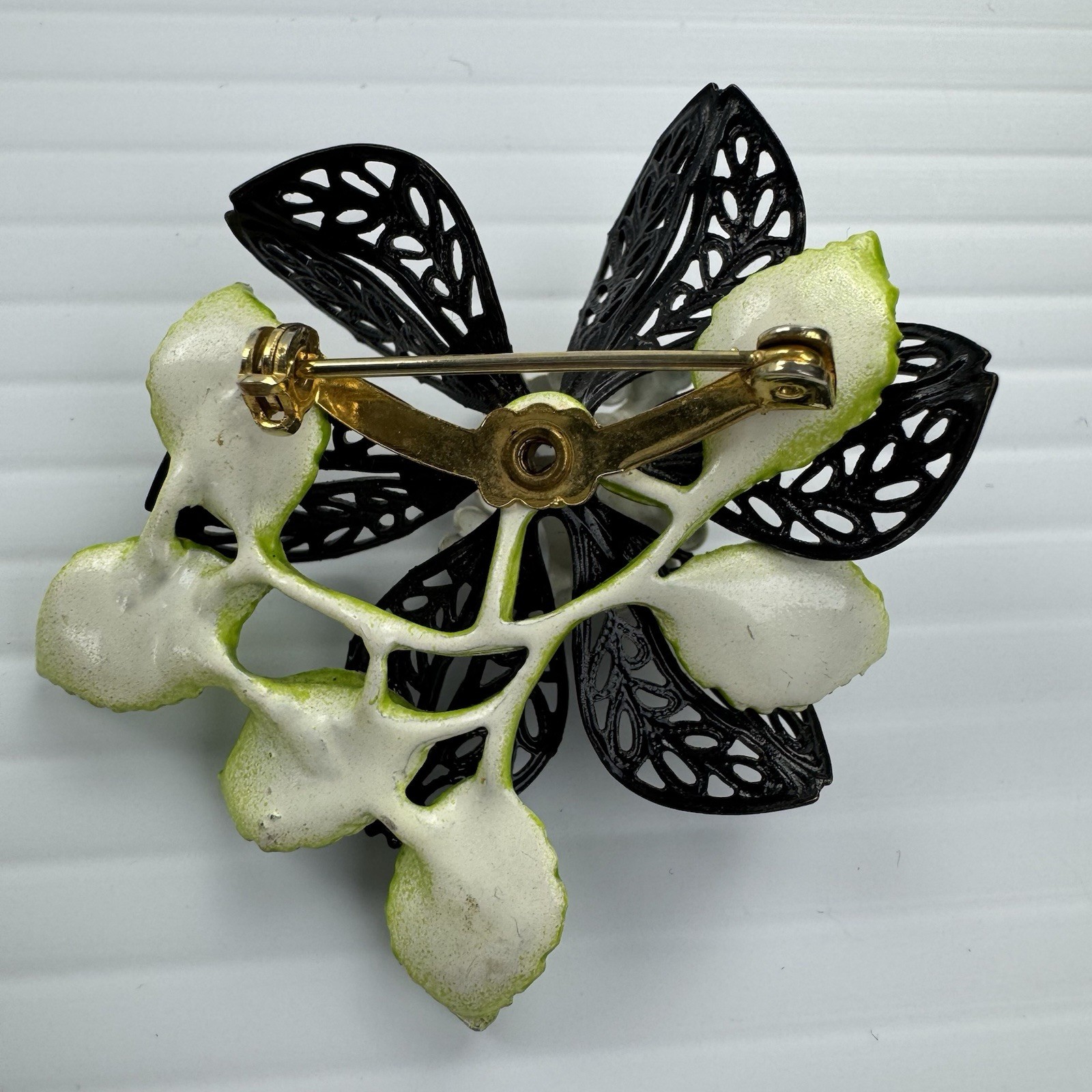 Vintage Enamel Flower Brooch Black White Green Filigree Leaf Statement Pin