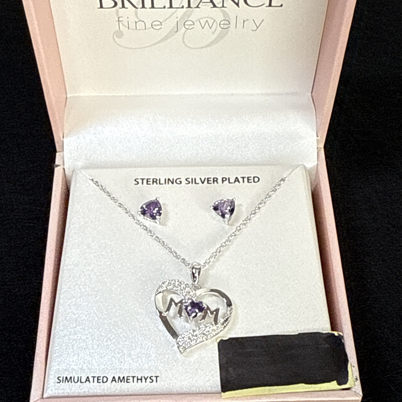 Brilliance fine jewelry necklace and earrings with the word “mom”