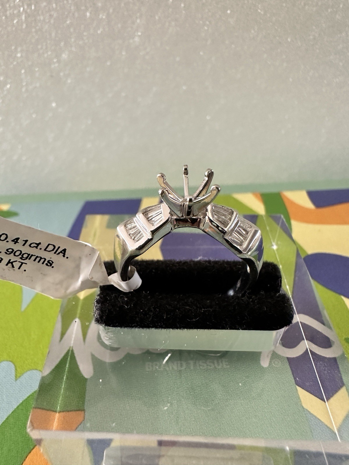 18kt.white gold semi mount ring with baguette diamonds size 7,4.90 gram.