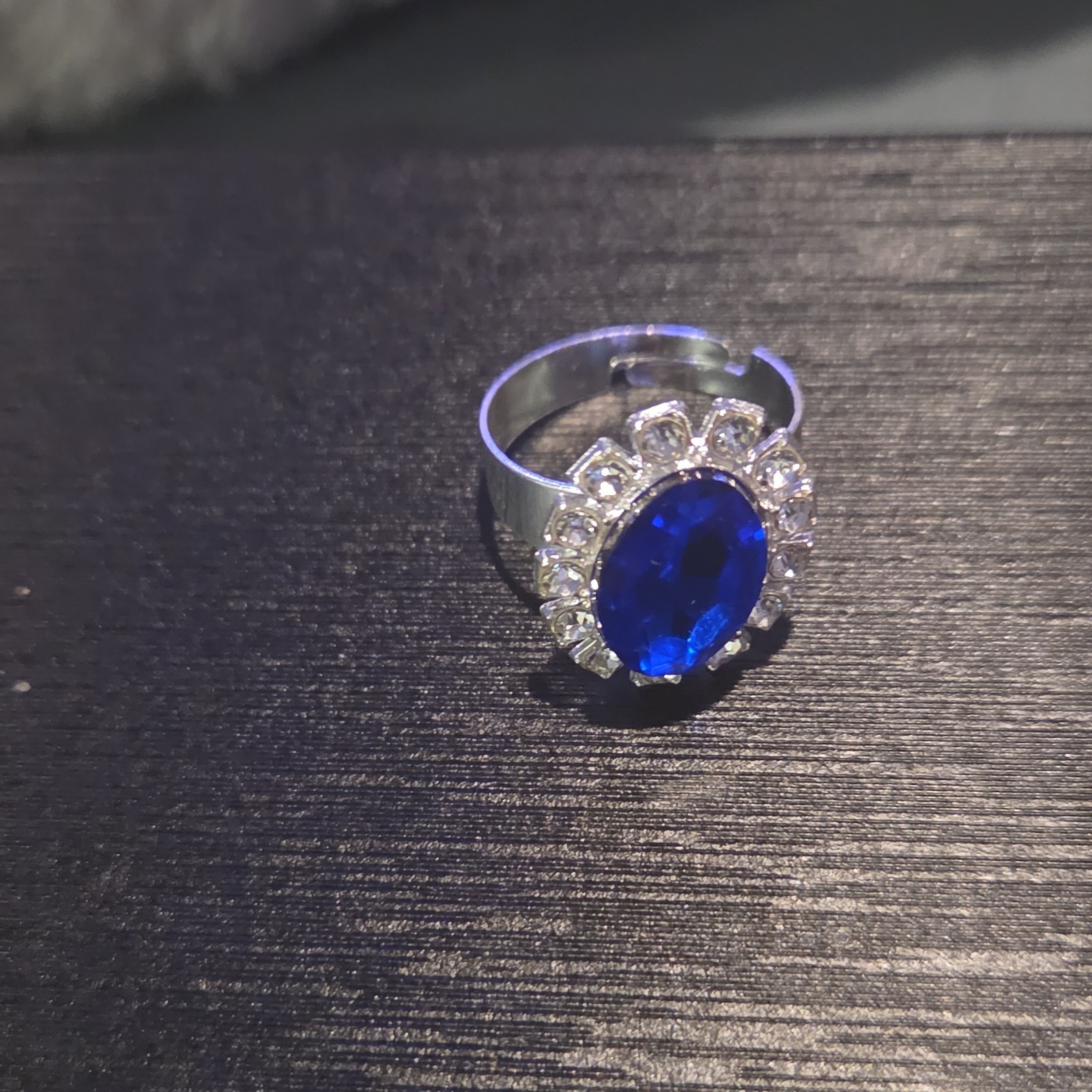 Silver Tone Cocktail Ring Size 8 Oval Blue Stone w/ Rhinestone Halo Accents