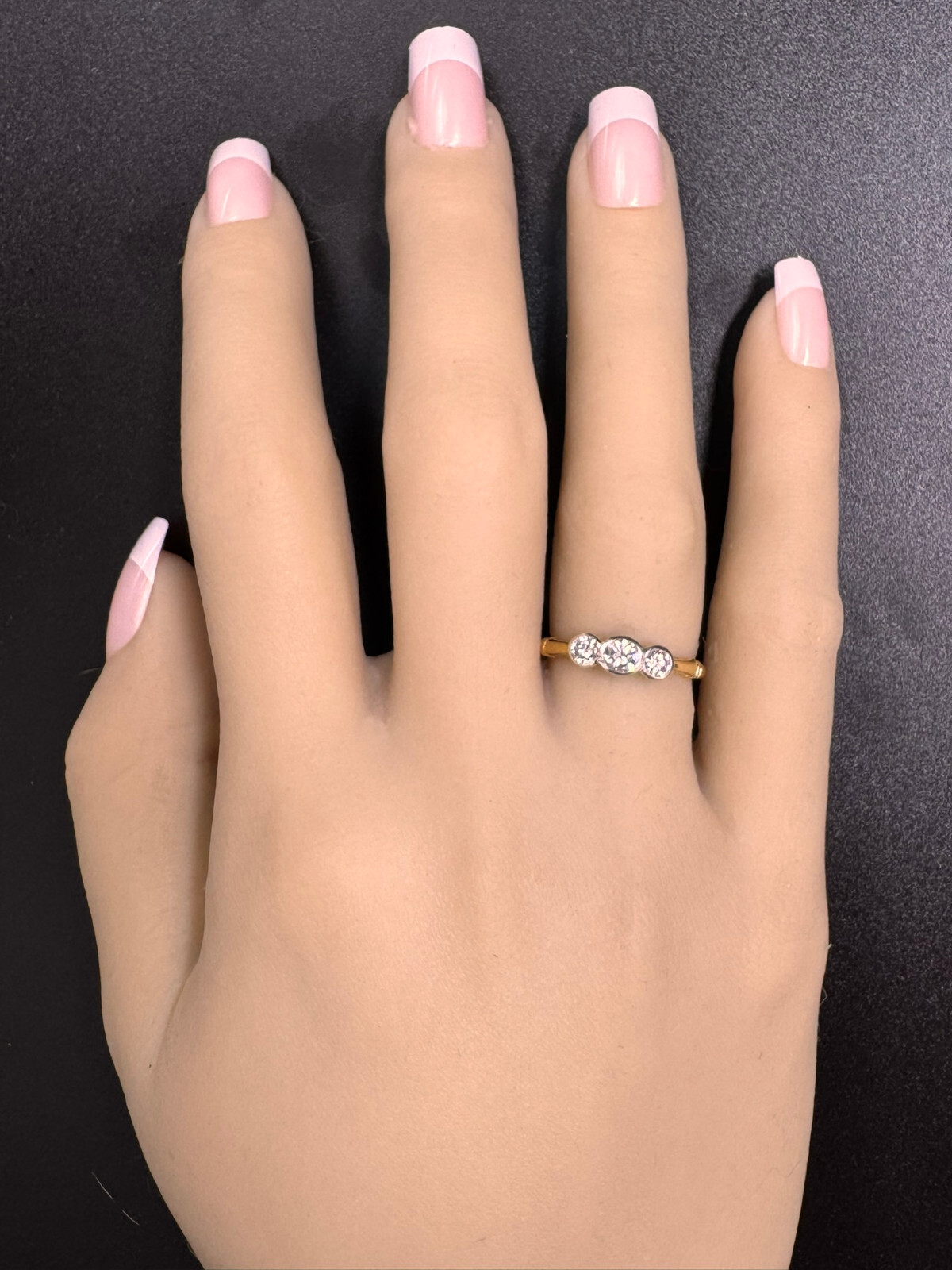 18 ct Yellow and White Gold Diamond Ring, two 0.07ct and a 0.20ct Diamonds