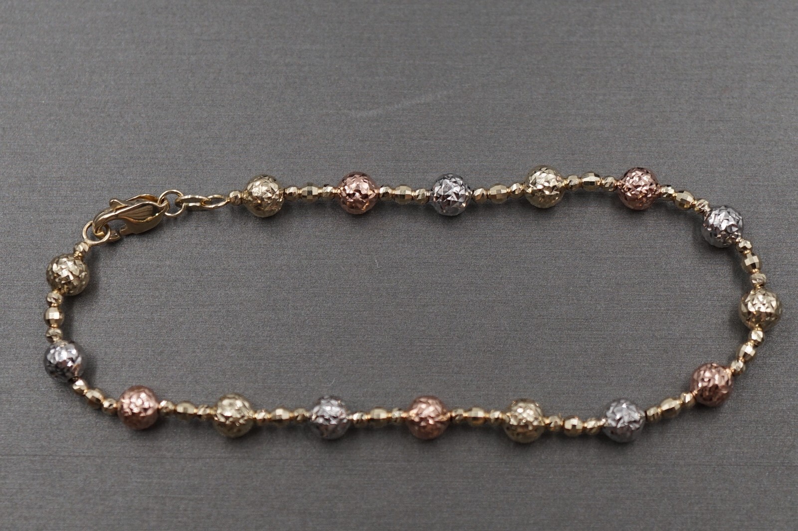 14K Yellow Gold 5MM Diamond Cut Light Tri Color Ball 7.5″ Bead Bracelet.
