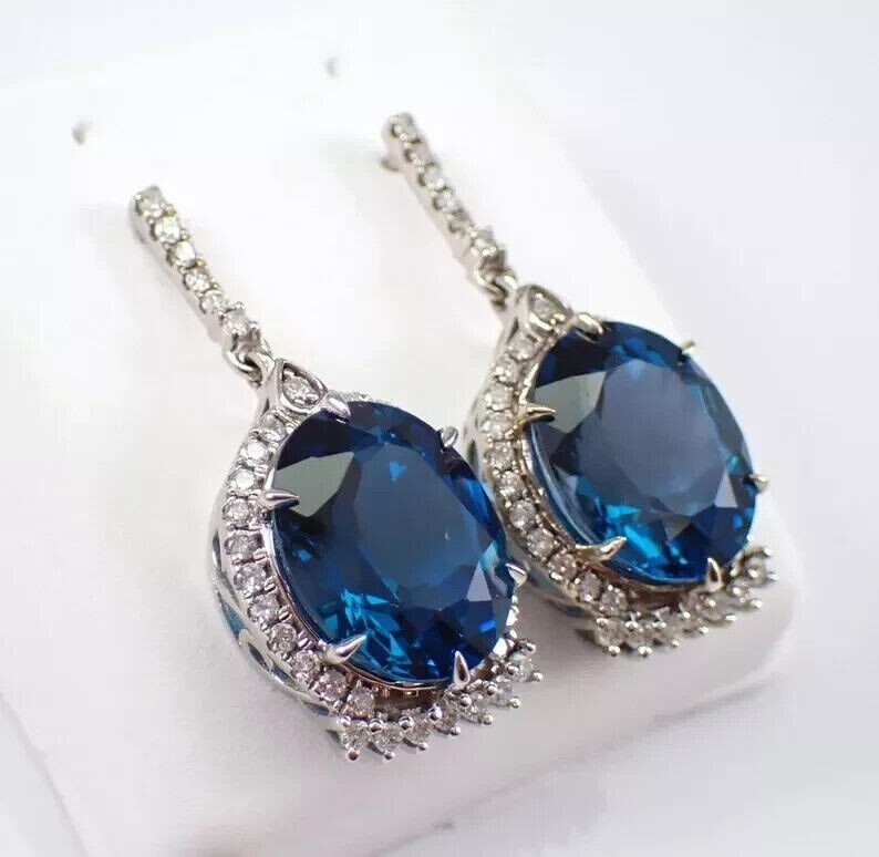 Oval Cut Simulated London Blue Topaz Halo Drop Earrings In 14k White Gold Plated