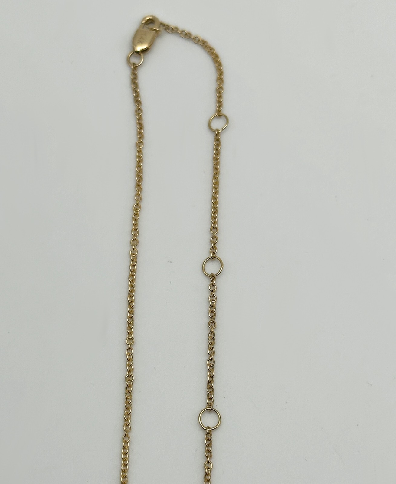 14k Gold 18″ Necklace, Horseshoe center piece set with 0.08cts of Diamonds 2g
