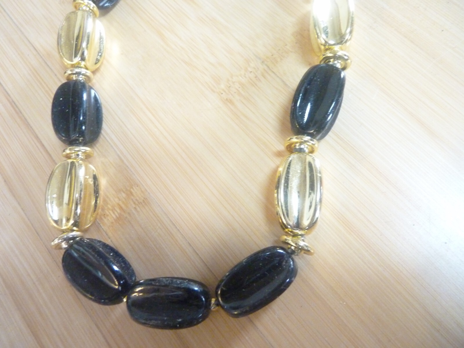 Black and Gold Wrapped Candy Necklace 22.5 inches long