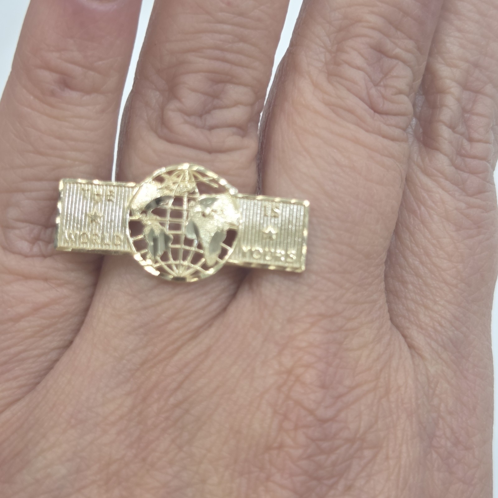 real 10k yellow Gold The World Is Yours Ring Size 9 10 11 12