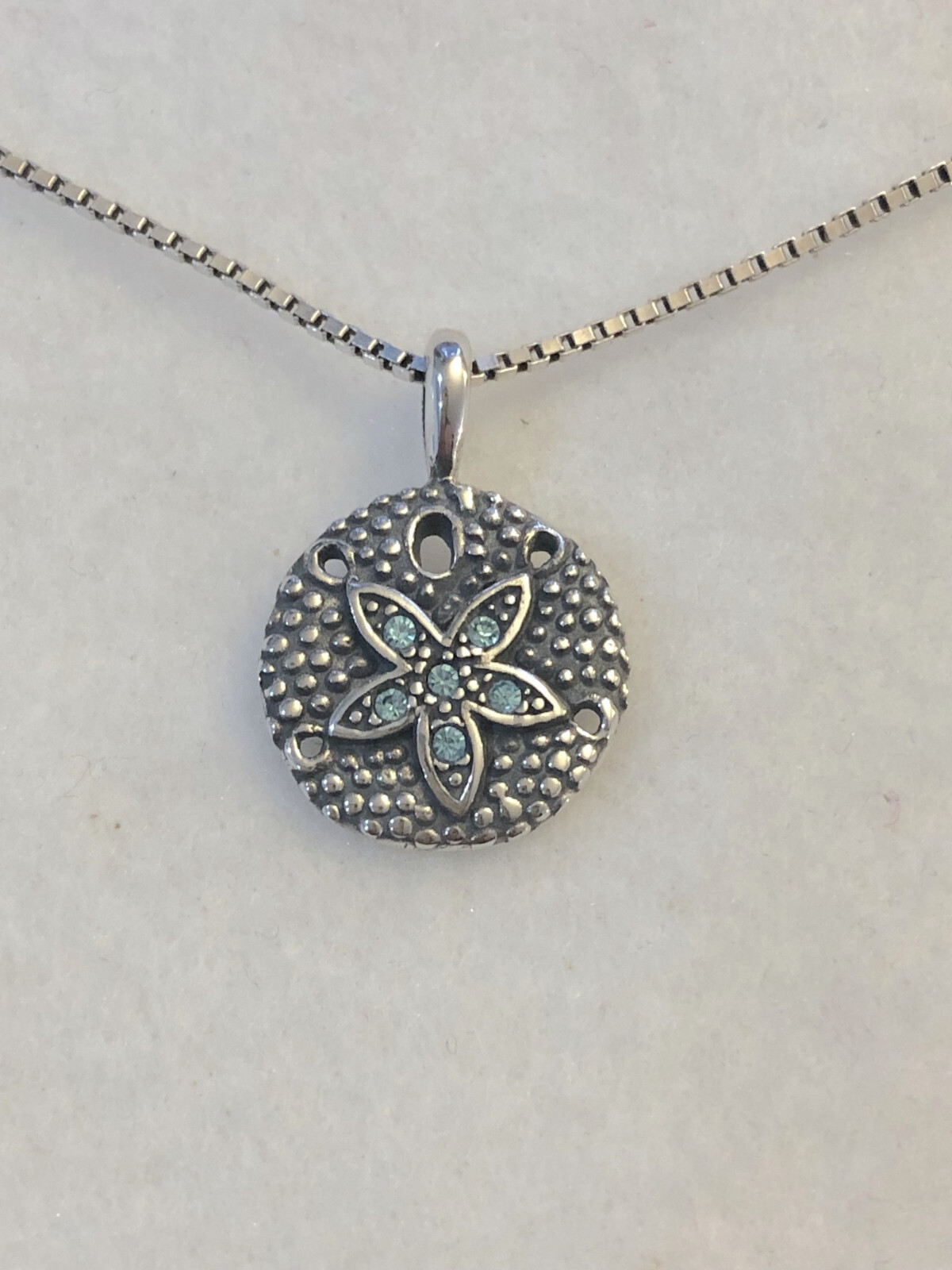 Wildthings Sterling Silver Sand Dollar Pendant w/Faceted Aqua Crystal Stones